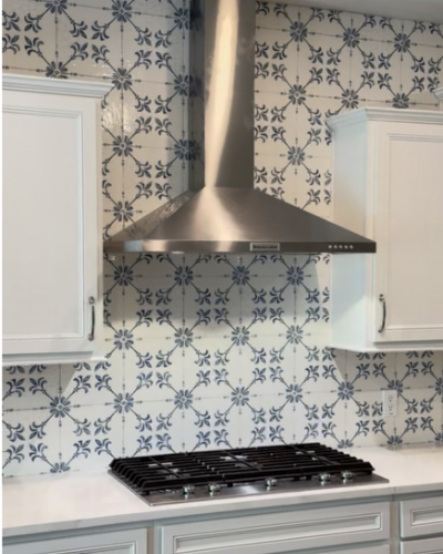 blue and white kitchen tile backsplash from Carpet Baggers Carpet One